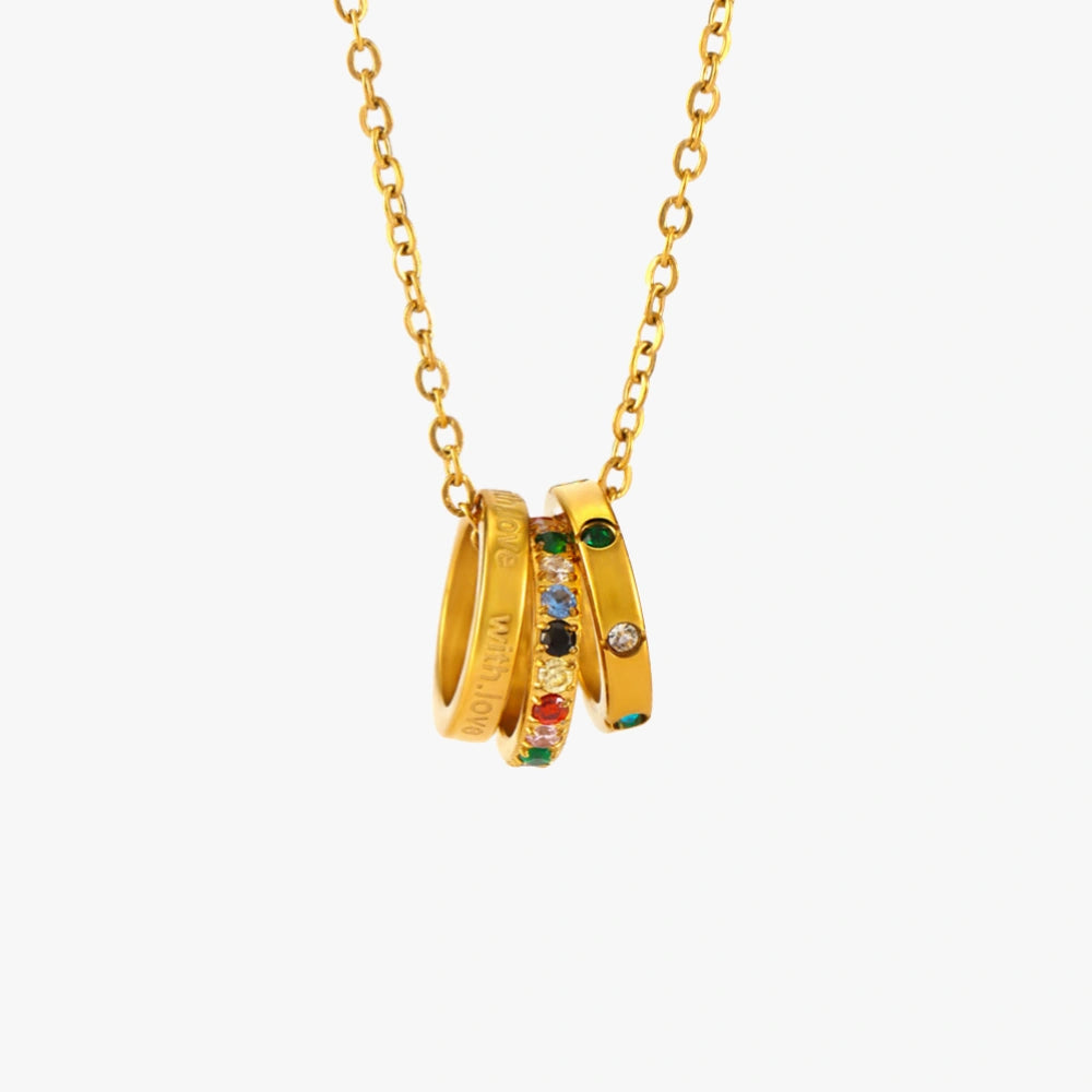 With Love Triple Ring Necklace featuring multicolor zircon stones on a stainless steel chain, perfect for adding a pop of color to any outfit.