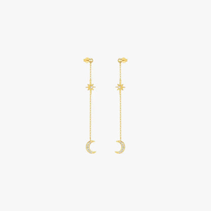 Elegant celestial moon and star earrings featuring sparkling crystals on a long chain, ideal for night sky-inspired fashion.
