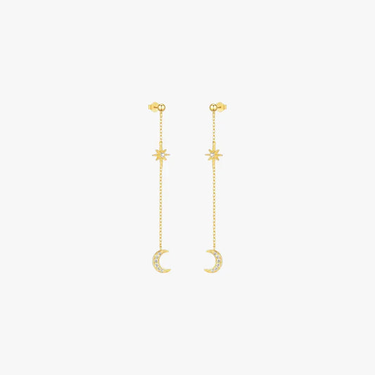 Elegant celestial moon and star earrings featuring sparkling crystals on a long chain, ideal for night sky-inspired fashion.