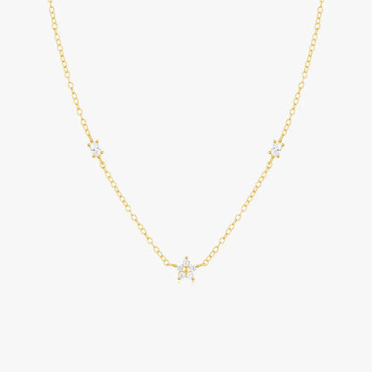 Delicate gold chain pearl necklace in minimalist style with multiple freshwater pearls.
