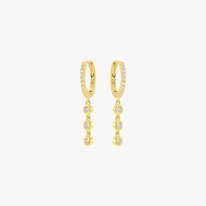 Gold crystal drop earrings for women, featuring a minimalist design with four bezel-set stones.