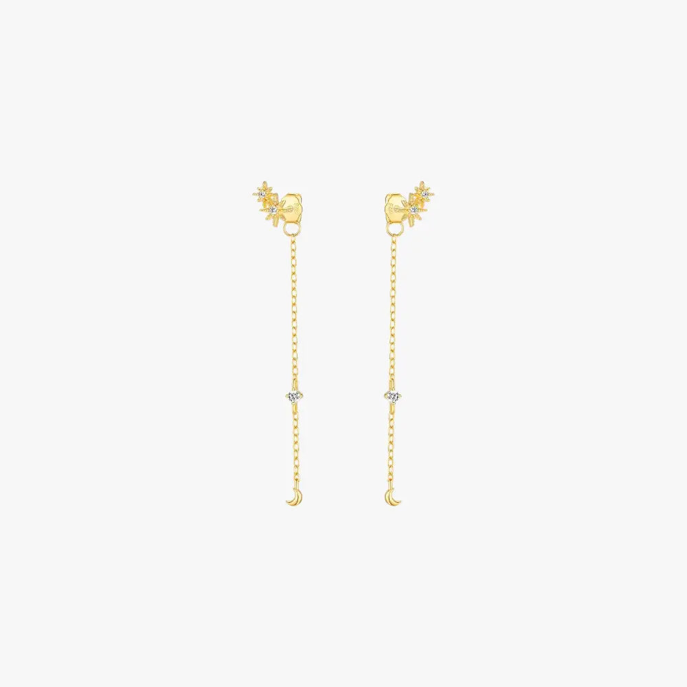 Gold star and moon long chain dangle earrings with delicate crystals, perfect for celestial jewelry lovers.