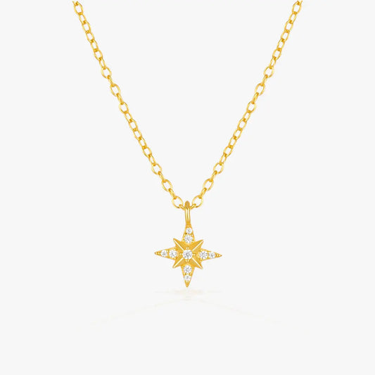 Gold star pendant necklace with delicate chain for a stylish and elegant look
