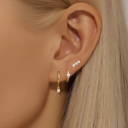 Crystal stud and diamond drop earrings set in S925 sterling silver, featuring a stylish and minimalist design for women.