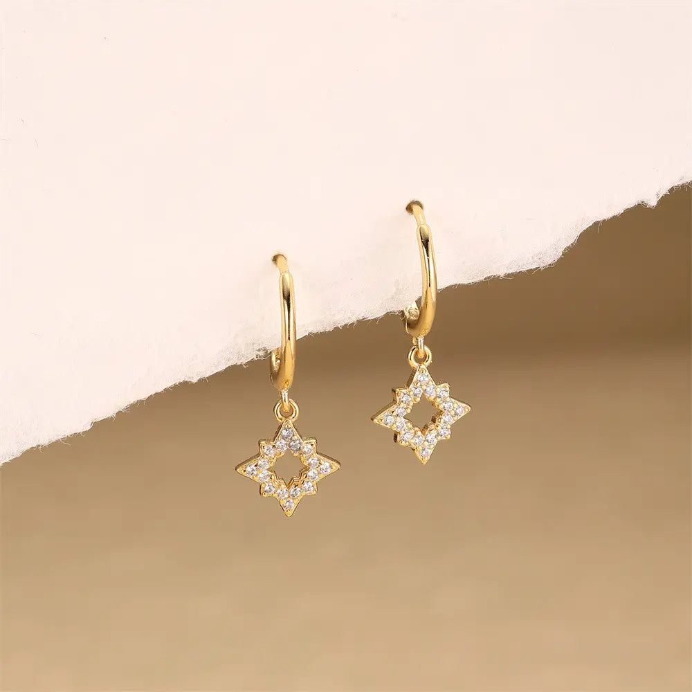 Boucles d'oreilles créoles pendantes en forme d'étoile géométrique